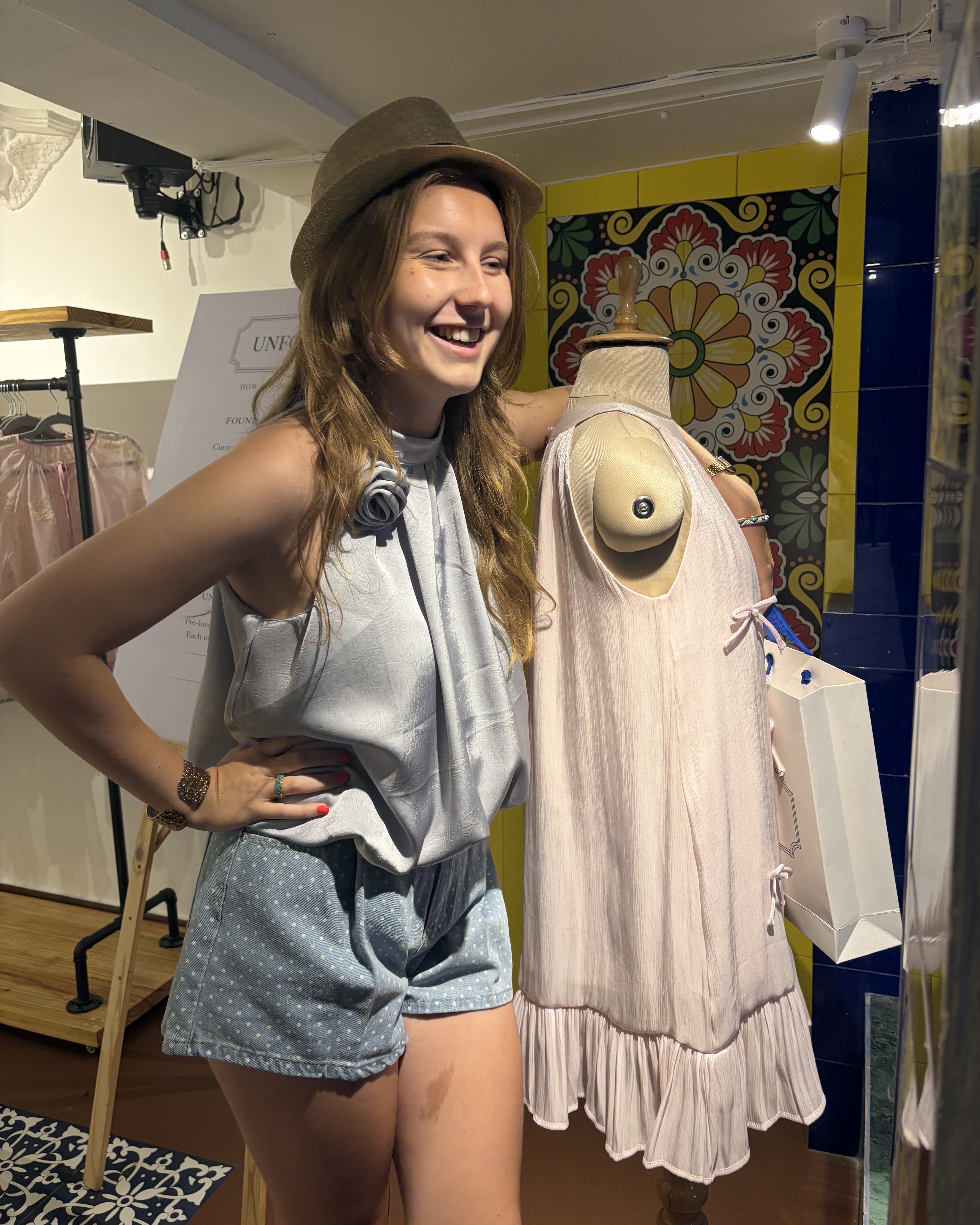 Inside Unfound — surfing tee and a look through the doorway