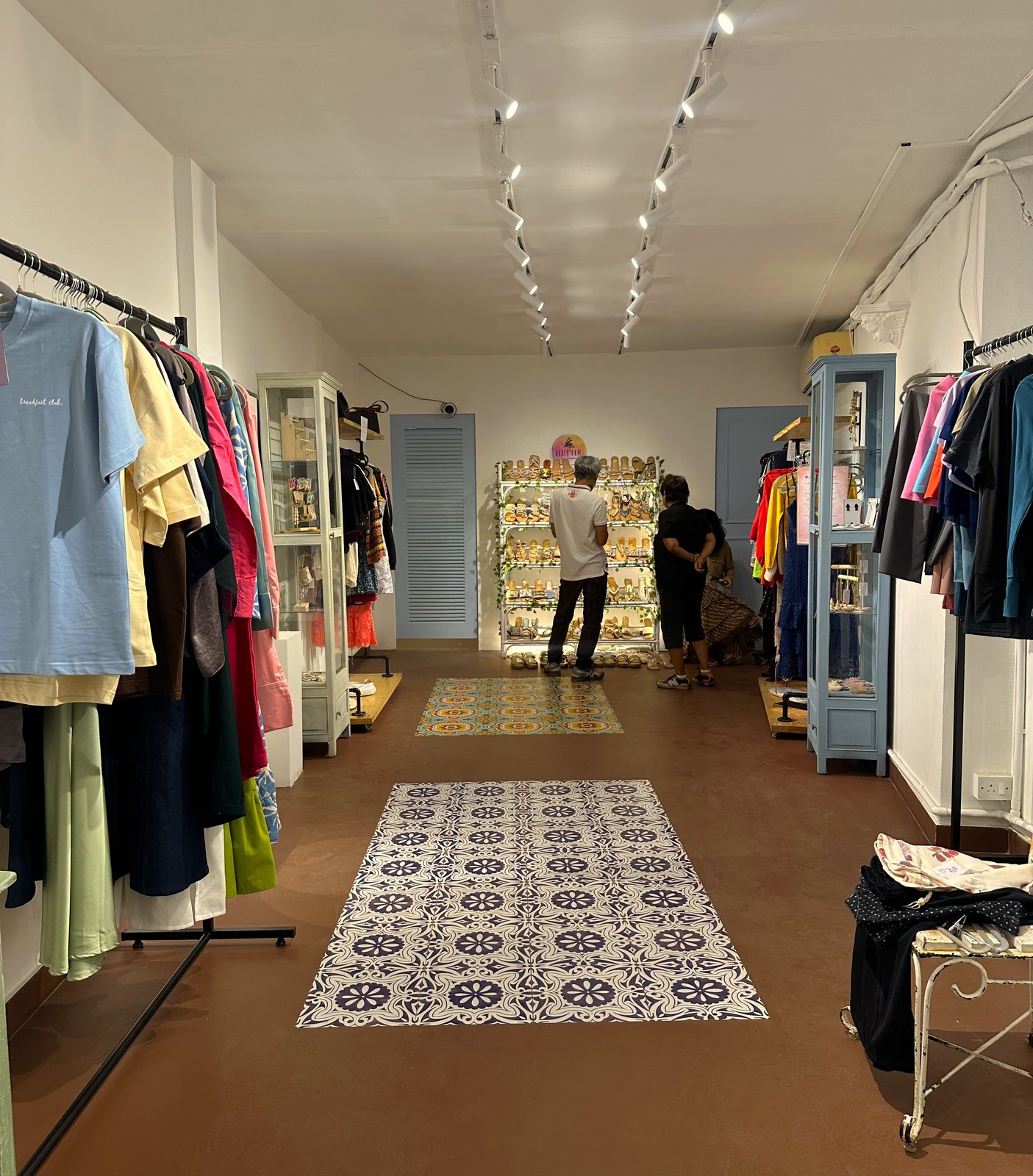 Inside the Unfound store — racks, cabinets and patterned floor tiles